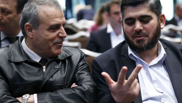 Members of the High Negotiations Committee (HNC) Asaad Al-Zoubi (L) and Mohamed Alloush of the Jaysh al Islam talk before a news conference aside of Syria peace talks in Geneva, Switzerland, April 19, 2016. Members of the High Negotiations Committee (HNC) Asaad Al-Zoubi (L) and Mohamed Alloush of the Jaysh al Islam talk before a news conference aside of Syria peace talks in Geneva, Switzerland, April 19, 2016. - Sputnik International