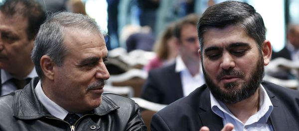 Members of the High Negotiations Committee (HNC) Asaad Al-Zoubi (L) and Mohamed Alloush of the Jaysh al Islam talk before a news conference aside of Syria peace talks in Geneva, Switzerland, April 19, 2016. Members of the High Negotiations Committee (HNC) Asaad Al-Zoubi (L) and Mohamed Alloush of the Jaysh al Islam talk before a news conference aside of Syria peace talks in Geneva, Switzerland, April 19, 2016. - Sputnik International