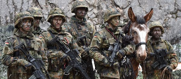 Mountain infantry soldiers, pictured after an exercise of the mountain infantry brigade 23 of the German Bundeswehr at an exercise area near the Bavarian village Bad Reichenhall, southern Germany, on March 23, 2016 Mountain infantry soldiers, pictured after an exercise of the mountain infantry brigade 23 of the German Bundeswehr at an exercise area near the Bavarian village Bad Reichenhall, southern Germany, on March 23, 2016 - Sputnik International