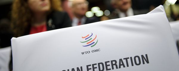 A label indicating the seats for the Russian delegation is seen prior to the start of a World Trade Organization ministerial meeting that gave its second and final approval for Russia's membership in the trade body after a record 18-year quest to join, on December 16, 2011 in Geneva A label indicating the seats for the Russian delegation is seen prior to the start of a World Trade Organization ministerial meeting that gave its second and final approval for Russia's membership in the trade body after a record 18-year quest to join, on December 16, 2011 in Geneva - Sputnik International