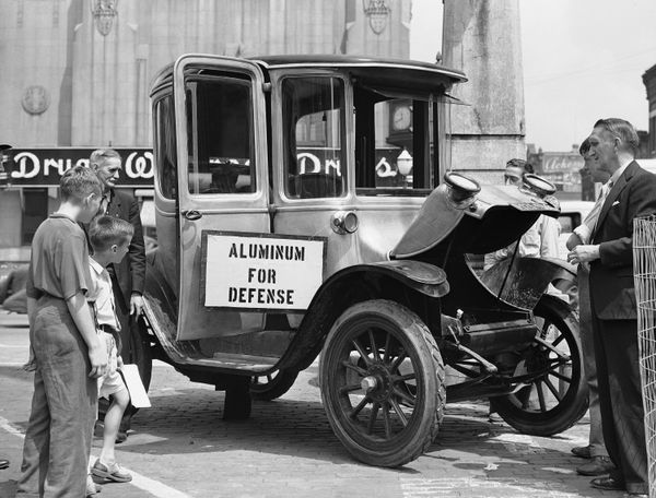 An object of unusual interest in downtown Elgin, Illinois on July 24, 1941, was this 1914 electric automobile, with aluminum body, donated as a contribution in the nation-wide campaign for collection of aluminum ware - Sputnik International