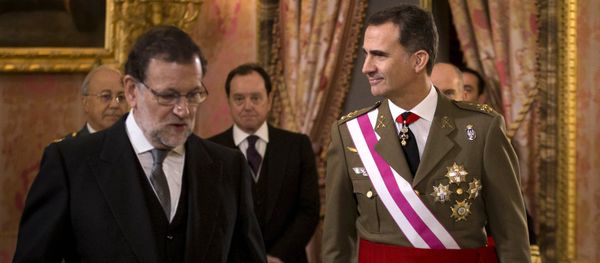 In this Wednesday, Jan. 6, 2016 file photo, Spain's King Felipe VI walks with Spain's Prime Minister Mariano Rajoy, left, during the annual Pascua Militar Epiphany ceremony at the Royal Palace in Madrid, Spain - Sputnik International