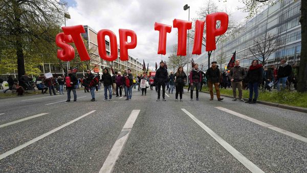 Protesters demonstrate against Transatlantic Trade and Investment Partnership (TTIP) free trade agreement ahead of U.S. President Barack Obama's visit in Hanover, Germany April 23, 2016 Protesters demonstrate against Transatlantic Trade and Investment Partnership (TTIP) free trade agreement ahead of U.S. President Barack Obama's visit in Hanover, Germany April 23, 2016 - Sputnik International