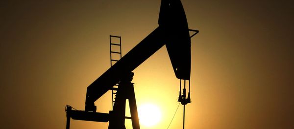 In this Wednesday, June 8, 2011 file photo, sun sets behind an oil pump in the desert oil fields of Sakhir, Bahrain - Sputnik International