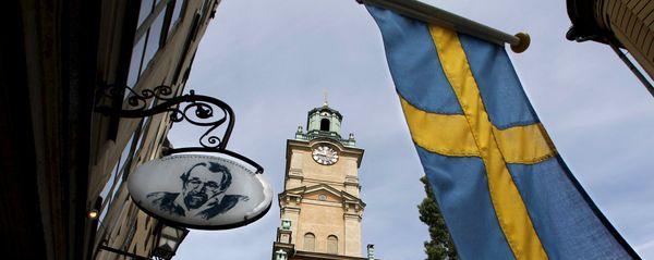Sweden's flag is seen near the Stockholm Cathedral in Gamla Stan or the Old Town district of Stockholm, Sweden Sweden's flag is seen near the Stockholm Cathedral in Gamla Stan or the Old Town district of Stockholm, Sweden - Sputnik International