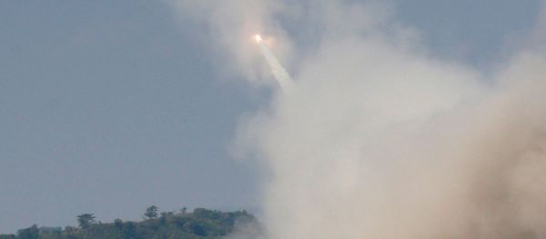 A US military fires a High Mobility Artillery Rocket System (HIMARS) during a military exercise. A US military fires a High Mobility Artillery Rocket System (HIMARS) during a military exercise. - Sputnik International