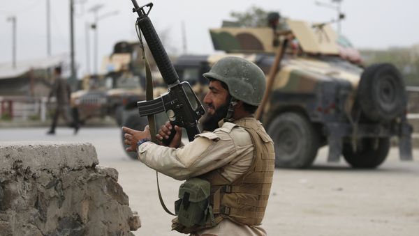 An Afghan National Army (ANA) soldier takes up position at the site of a suicide car bomb attack in Kabul, Afghanistan. (File) - Sputnik International