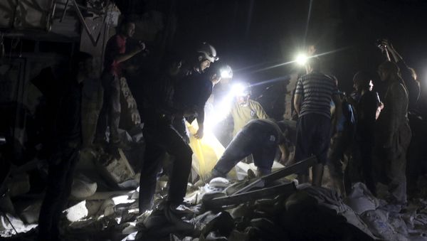 Civil defence members search for survivors after an airstrike at a field hospital in the rebel held area of al-Sukari district of Aleppo, Syria April 27, 2016 Civil defence members search for survivors after an airstrike at a field hospital in the rebel held area of al-Sukari district of Aleppo, Syria April 27, 2016 - Sputnik International