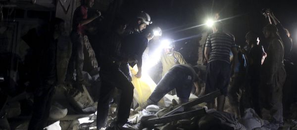 Civil defence members search for survivors after an airstrike at a field hospital in the rebel held area of al-Sukari district of Aleppo, Syria April 27, 2016 Civil defence members search for survivors after an airstrike at a field hospital in the rebel held area of al-Sukari district of Aleppo, Syria April 27, 2016 - Sputnik International