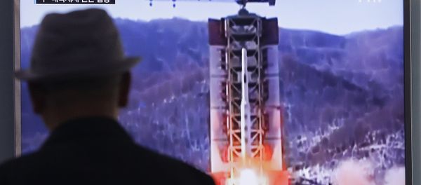A man watches a TV news program showing a file footage of North Korea's rocket launch at Seoul Railway Station in Seoul, South Korea, Thursday, April 28, 2016. A man watches a TV news program showing a file footage of North Korea's rocket launch at Seoul Railway Station in Seoul, South Korea, Thursday, April 28, 2016. - Sputnik International