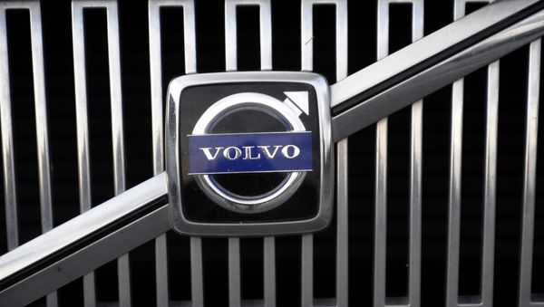 The logo of the Swedish car manufacturer Volvo is pictured on a car in Gothenburg, southwestern Sweden The logo of the Swedish car manufacturer Volvo is pictured on a car in Gothenburg, southwestern Sweden - Sputnik International