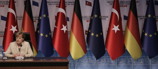 German Chancellor Angela Merkel gives a press conference after visiting Nizip refugee camp on the Turkish-Syrian border, in Gaziantep on April 23, 2016. German Chancellor Angela Merkel gives a press conference after visiting Nizip refugee camp on the Turkish-Syrian border, in Gaziantep on April 23, 2016. - Sputnik International