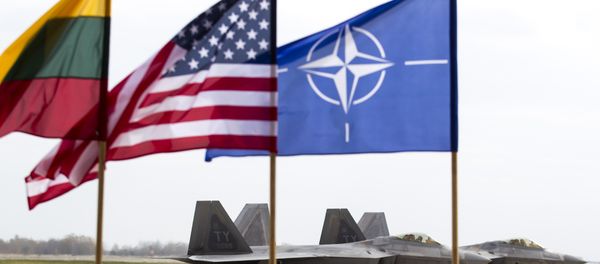 US Air Force F-22 Raptor fighter jets stand on the tarmac after landing at the Siauliai airbase, some 230 km (144 miles) east of the capital Vilnius, Lithuania, Wednesday, April 27, 2016. US Air Force F-22 Raptor fighter jets stand on the tarmac after landing at the Siauliai airbase, some 230 km (144 miles) east of the capital Vilnius, Lithuania, Wednesday, April 27, 2016. - Sputnik International