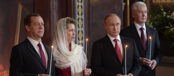 Russian President Vladimir Putin and Russian Prime Minister Dmitry Medvedev attend Easter service at Christ the Savior Cathedral in Moscow Russian President Vladimir Putin and Russian Prime Minister Dmitry Medvedev attend Easter service at Christ the Savior Cathedral in Moscow - Sputnik International