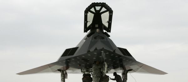 An F-117 stealth fighter jet is inspected after it landed at Wright Patterson Air Force Base, Monday, March 10, 2008, in Dayton, Ohio An F-117 stealth fighter jet is inspected after it landed at Wright Patterson Air Force Base, Monday, March 10, 2008, in Dayton, Ohio - Sputnik International