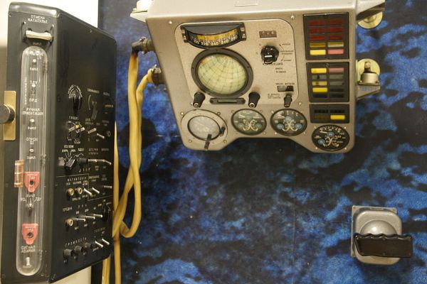 Layout of Vostok spacecraft cabin, 1961. Left: Main switchboard (ПКРС,PKRS, Panel of rocket systems control). Center: Panel with flight instruments, indicators and annunciators. Right: hand controller (stick) of reaction control system thrusters Layout of Vostok spacecraft cabin, 1961. Left: Main switchboard (ПКРС,PKRS, Panel of rocket systems control). Center: Panel with flight instruments, indicators and annunciators. Right: hand controller (stick) of reaction control system thrusters - Sputnik International