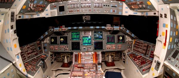 The cockpit of the orbiter Atlantis is seen in the round, revealing the new full-color flat panel Multifunction Electronic Display Subsystem (MEDS), also called the glass cockpit. The cockpit of the orbiter Atlantis is seen in the round, revealing the new full-color flat panel Multifunction Electronic Display Subsystem (MEDS), also called the glass cockpit. - Sputnik International