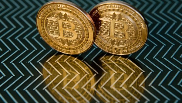 Australian entrepreneur Craig Wright on May 2, 2016 identified himself as the creator of Bitcoin, following years of speculation about who invented the pioneering digital currency - Sputnik International