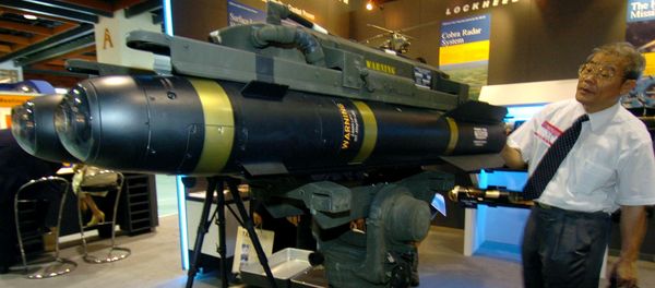 A man looks at the latest US-made Hellfire II missiles during at the defense industry exhibition in Taipei, 11 August 2005 A man looks at the latest US-made Hellfire II missiles during at the defense industry exhibition in Taipei, 11 August 2005 - Sputnik International