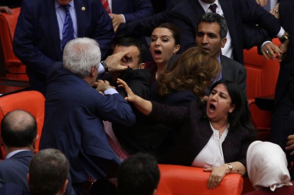 Ruling AK Party and pro-Kurdish Peoples' Democratic Party (HDP) lawmakers scuffle during a debate at the Parliament in Ankara, Turkey late April 27, 2016 Ruling AK Party and pro-Kurdish Peoples' Democratic Party (HDP) lawmakers scuffle during a debate at the Parliament in Ankara, Turkey late April 27, 2016 - Sputnik International