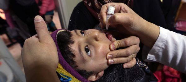 Syrian refugee Mohammed Sammor, 3, receives vaccination against polio (File) Syrian refugee Mohammed Sammor, 3, receives vaccination against polio (File) - Sputnik International