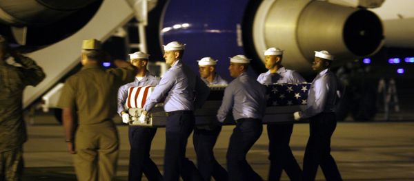 A Navy carry team carries the transfer case (File) - Sputnik International