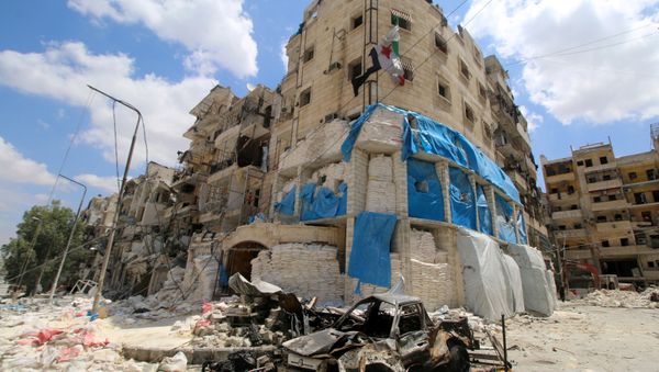 Burnt vehicles are pictured in front of the damaged the Medecins Sans Frontieres (MSF)-backed al-Quds hospital after it was hit by airstrikes, in a rebel-held area of Syria's Aleppo, April 28, 2016 Burnt vehicles are pictured in front of the damaged the Medecins Sans Frontieres (MSF)-backed al-Quds hospital after it was hit by airstrikes, in a rebel-held area of Syria's Aleppo, April 28, 2016 - Sputnik International