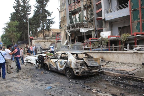 Journalists and civilians stand near the damage after rockets fired by insurgents hit the al-Dabit maternity clinic in government-held parts of Aleppo city, Syria, in this handout picture provided by SANA on May 3, 2016 Journalists and civilians stand near the damage after rockets fired by insurgents hit the al-Dabit maternity clinic in government-held parts of Aleppo city, Syria, in this handout picture provided by SANA on May 3, 2016 - Sputnik International