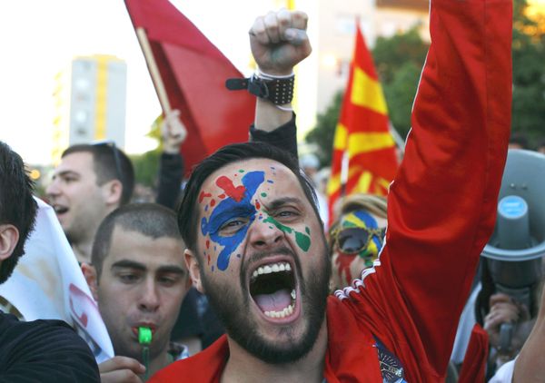 A demonstrator is seen with his face painted in support of a colorful revolution during a protest against the government, in front of the EU office in Skopje, Macedonia April 21, 2016. - Sputnik International