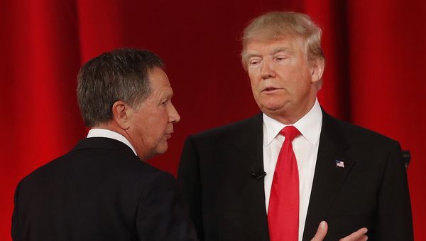 Republican presidential candidate, Ohio Gov. John Kasich, left, speaks to Republican presidential candidate, businessman Donald Trump Republican presidential candidate, Ohio Gov. John Kasich, left, speaks to Republican presidential candidate, businessman Donald Trump - Sputnik International