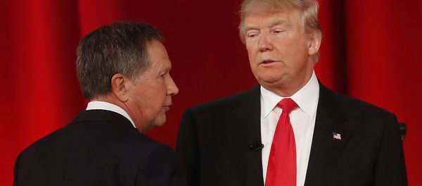 Republican presidential candidate, Ohio Gov. John Kasich, left, speaks to Republican presidential candidate, businessman Donald Trump Republican presidential candidate, Ohio Gov. John Kasich, left, speaks to Republican presidential candidate, businessman Donald Trump - Sputnik International