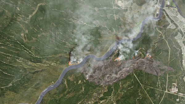 Smoke from wildfires near Fort McMurray, Alberta, Canada are shown in this satellite photo from NASA taken May 3, 2016. - Sputnik International