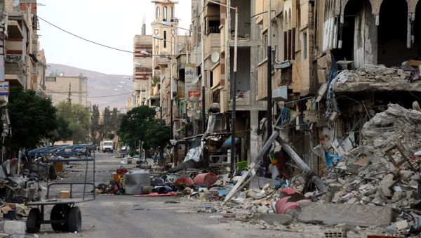 Destroyed buildings in Palmyra. - Sputnik International