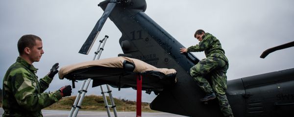 Soldiers from the Swedish Armed Forces prepare an Blackhawk helicopter at Hagshult Airbase, about 240km North-East of Malmo, Sweden - Sputnik International