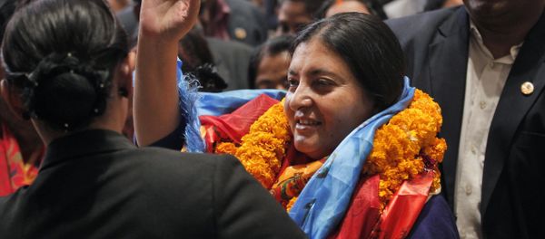 Bidhya Devi Bhandari of the Communist Party of Nepal Unified Marxist-Leninist waves her hand. Bidhya Devi Bhandari of the Communist Party of Nepal Unified Marxist-Leninist waves her hand. - Sputnik International