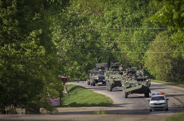 US military vehicles drive on a road in Sculeni, Moldova, Tuesday, May 3, 2016, as some 200 U.S. soldiers arrived in the country for more than two weeks of exercises, in a show of U.S. strength in the region - Sputnik International