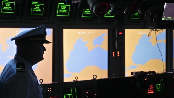 A US Navy officer, name not available, looks on at the weapons control deck of the USS Monterey in the Black Sea port of Constanta, Romania, Tuesday, June 7, 2011 - Sputnik International