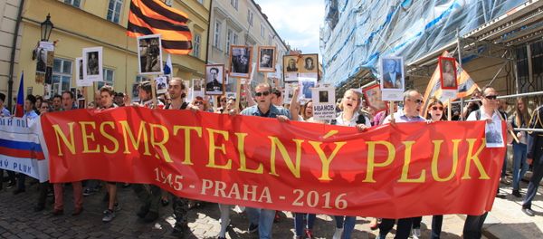 Some 700 people on Sunday took part in the first Immortal Regiment patriotic initiative held in the Czech capital of Prague, a RIA Novosti correspondent reported. Some 700 people on Sunday took part in the first Immortal Regiment patriotic initiative held in the Czech capital of Prague, a RIA Novosti correspondent reported. - Sputnik International