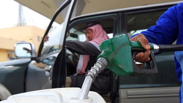 An employee fills a container with diesel at a gas station in Riyadh. An employee fills a container with diesel at a gas station in Riyadh. - Sputnik International