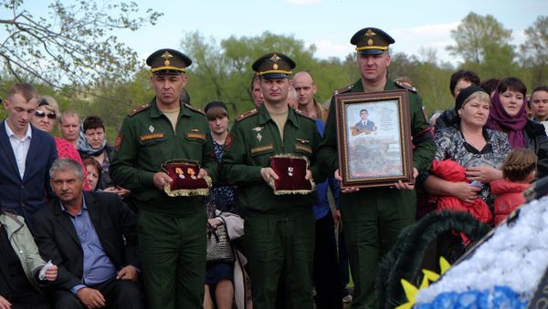 The funeral of Alexander Prokhorenko, a Russian special forces officer killed in action in Syria on March 17. - Sputnik International