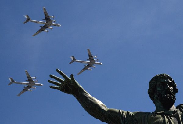 The Tu-95MS bombers are seen flying during the rehearsal of the May 9 Victory Day Parade in Moscow  - Sputnik International
