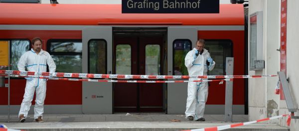 Police officers investigate at the scene of a stabbing at a station in Grafing near Munich, Germany, Tuesday, May 10, 2016 Police officers investigate at the scene of a stabbing at a station in Grafing near Munich, Germany, Tuesday, May 10, 2016 - Sputnik International