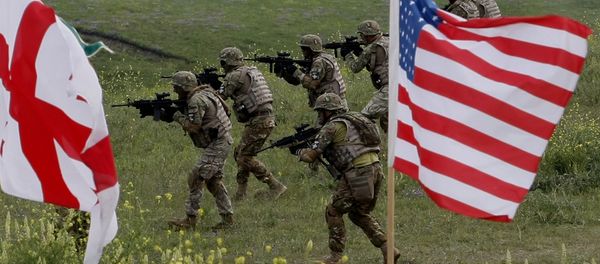 US and Georgian servicemen, with Georgian and US flags in front, take part in the joint US-Georgia military exercise (File) US and Georgian servicemen, with Georgian and US flags in front, take part in the joint US-Georgia military exercise (File) - Sputnik International