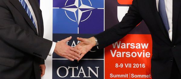 Logo for the upcoming NATO Warsaw summit 2016 - Sputnik International