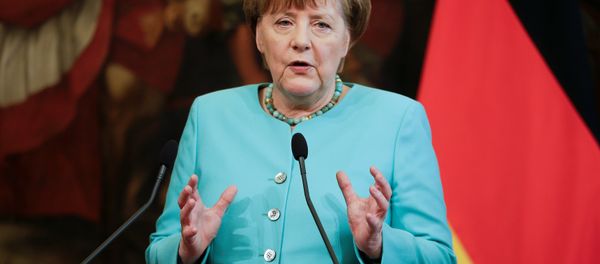 German Chancellor Angela Merkel speaks next to Italian Prime Minister Matteo Renzi (not seen) during a news conference at Chigi Palace in Rome, Italy May 5, 2016. German Chancellor Angela Merkel speaks next to Italian Prime Minister Matteo Renzi (not seen) during a news conference at Chigi Palace in Rome, Italy May 5, 2016. - Sputnik International