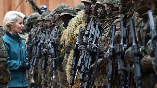 German Minister of Defense Ursula von der Leyen (C) posing with mountain infantry soldiers of the mountain infantry brigade 23 after she watched an exercise near the Bavarian village Bad Reichenhall, southern Germany, on March 23, 2016 German Minister of Defense Ursula von der Leyen (C) posing with mountain infantry soldiers of the mountain infantry brigade 23 after she watched an exercise near the Bavarian village Bad Reichenhall, southern Germany, on March 23, 2016 - Sputnik International