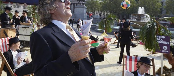 London's Trafalgar Square transformed into an interactive, tropical tax haven by Oxfam, Action Aid and Christian Aid. London's Trafalgar Square transformed into an interactive, tropical tax haven by Oxfam, Action Aid and Christian Aid. - Sputnik International