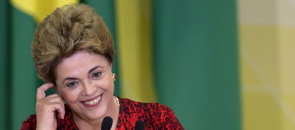 Brazil's President Dilma Rousseff smiles as she attends a signing ceremony for new universities at Planalto Palace in Brasilia, Brazil Brazil's President Dilma Rousseff smiles as she attends a signing ceremony for new universities at Planalto Palace in Brasilia, Brazil - Sputnik International