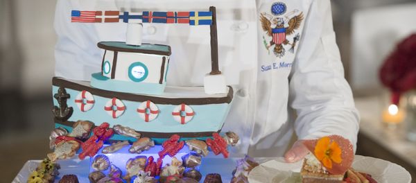 White House pastry chef Susie Morrison holds a dessert featuring a handcrafted fishing boat surrounded by miniature pastries during a press preview of a State Dinner in honor of the Nordic countries, including Sweden, Norway, Finland, Denmark and Iceland, in the State Dining Room of the White House in Washington, DC, May 12, 2016. White House pastry chef Susie Morrison holds a dessert featuring a handcrafted fishing boat surrounded by miniature pastries during a press preview of a State Dinner in honor of the Nordic countries, including Sweden, Norway, Finland, Denmark and Iceland, in the State Dining Room of the White House in Washington, DC, May 12, 2016. - Sputnik International
