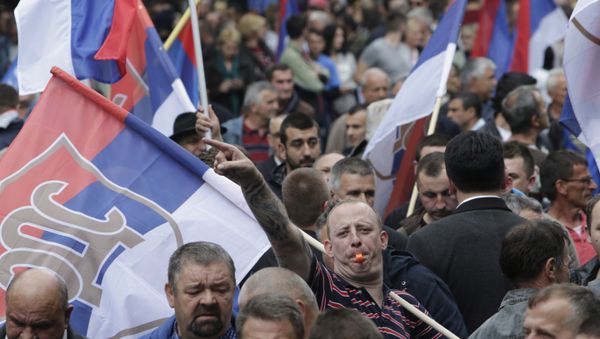 Bosnian Serb people waves flags during a demonstration in Banja Luka, Bosnia, on Saturday, May 14, 2016 Bosnian Serb people waves flags during a demonstration in Banja Luka, Bosnia, on Saturday, May 14, 2016 - Sputnik International